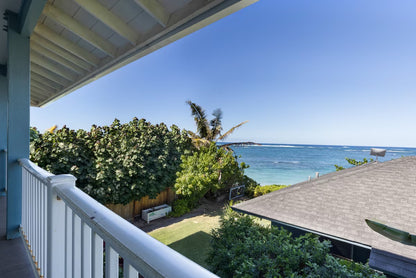 Laʻau Paina Beachfront Estate | House + Cottage