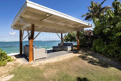 Laʻau Paina Beachfront Estate | House + Cottage