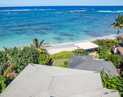 Laʻau Paina Beachfront Estate | House + Cottage